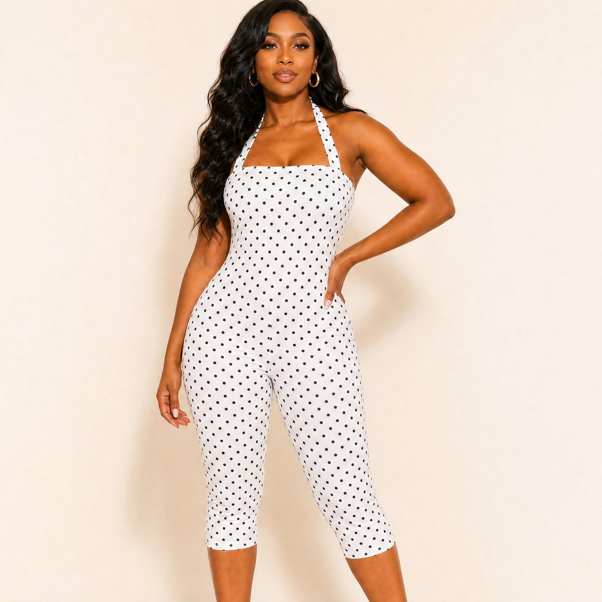 White polka dot halter playsuit, capri-length jumpsuit, front view
