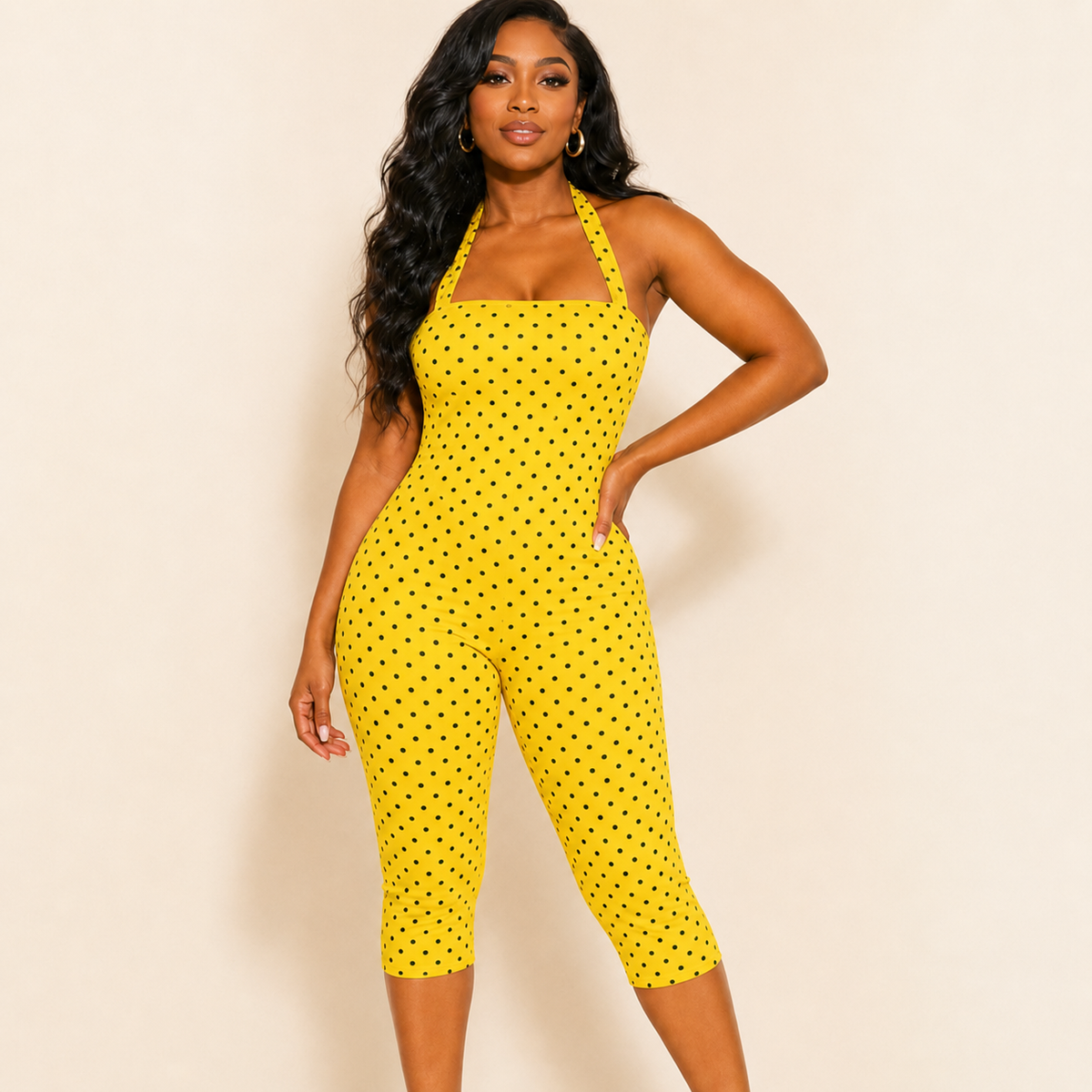Yellow polka dot halter playsuit, capri-length jumpsuit, front view
