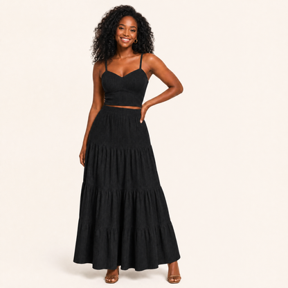 Black two-piece A-line set, cropped ribbed cami top and tiered maxi skirt, front view