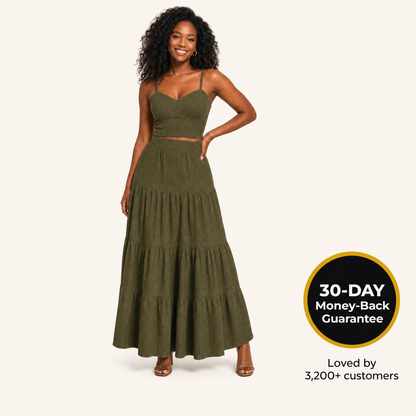 Woman wearing olive green two-piece maxi skirt set, backed by a 30-day money-back guarantee